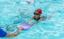 Why are swimming lessons ideal for children?